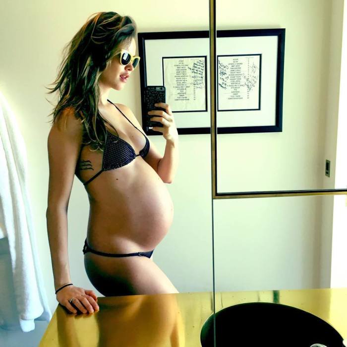Pregnant celebrities in bikinis and swimsuits -- beach body baby