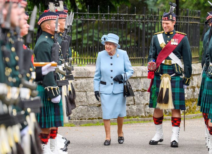 King Charles giggles in a kilt with his sister and his queen at the ...