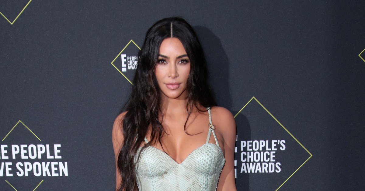 Kim Kardashian is again accused of Photoshopping bikini pic.jpg