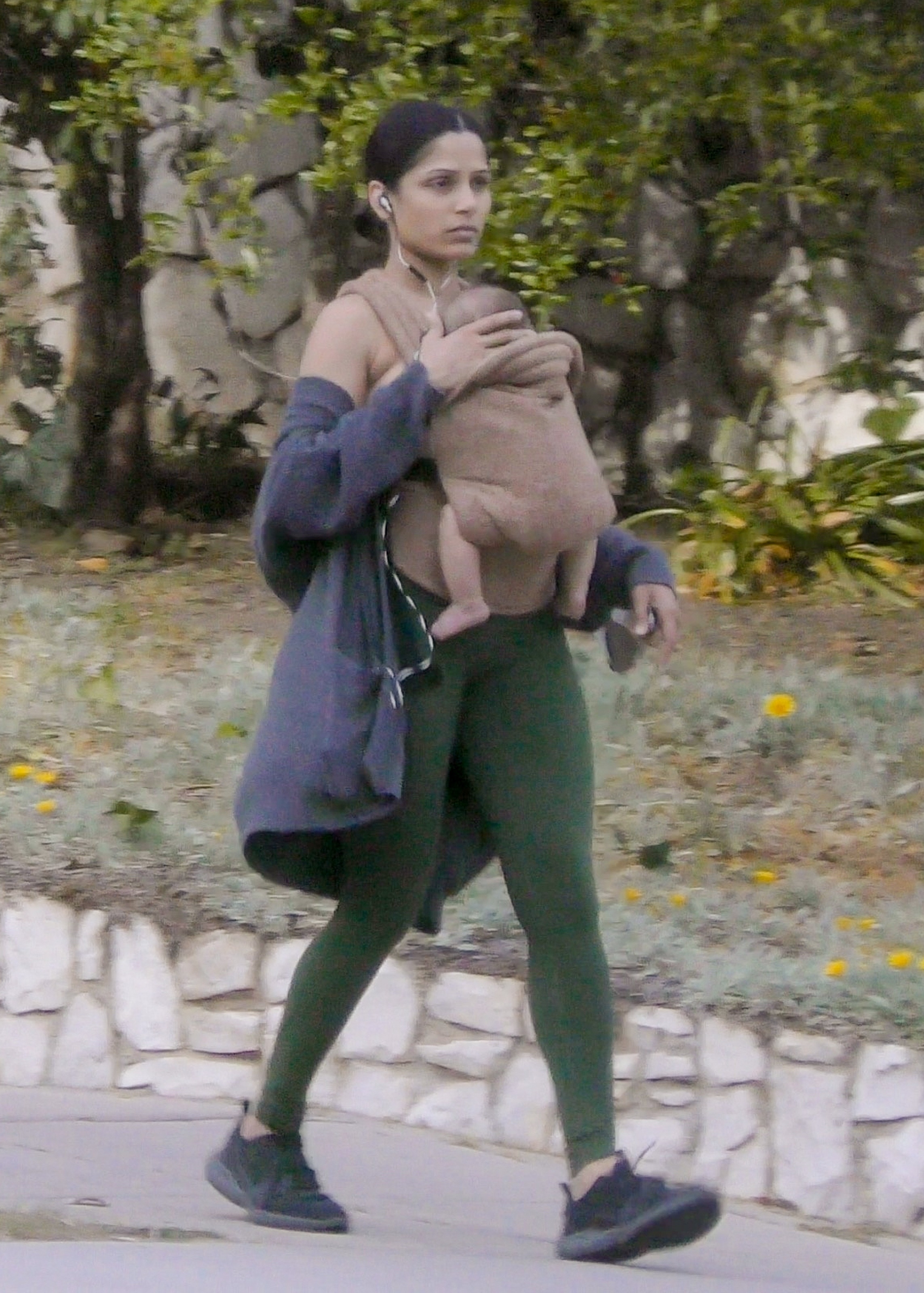 Freida Pinto takes her baby boy Rumi for an afternoon stroll