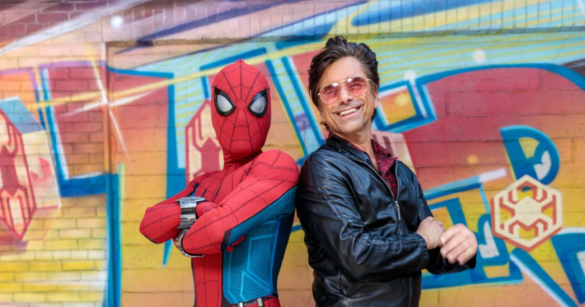 John Stamos hangs out with Spider-Man on the Avengers Campus at California Adventure, plus more great photos of celebs at Disney theme parks.jpg