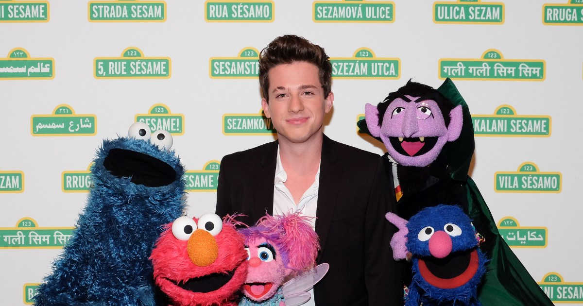 A pop star gets up close and personal with Cookie Monster, Elmo and Grover, more stars hanging out with ‘Sesame Street’ characters | Gallery