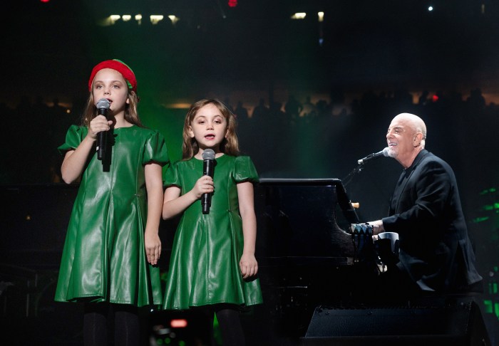 A music legend shares the stage with two very special singers